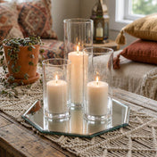 Three lit pillar candles in glass cylinder vases on a octagonal mirror tray - thumbnail number 3