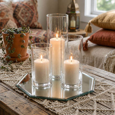 Three lit pillar candles in glass cylinder vases on a octagonal mirror tray - thumbnail number 3