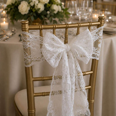 White Chantilly lace sash tied in a bow on a gold chair - thumbnail number 4
