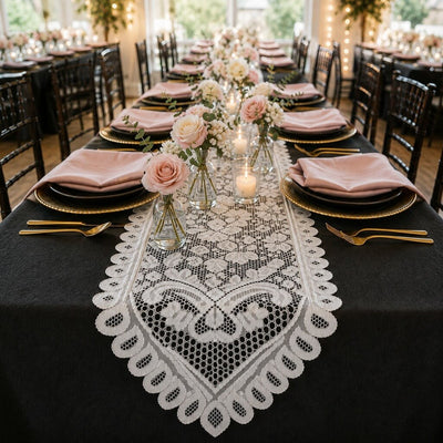 White lace table runner on a wedding dining table with pink roses and candles - thumbnail number 4