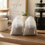 White 5x7in muslin favor bags filled with coffee beans, part of a 12-pack on a coffee station - thumbnail number 8