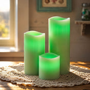 Green LED pillar candles in assorted sizes on crochet table runner - thumbnail number 13