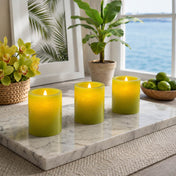 Three green LED votive candles beside window and indoor plants - thumbnail number 6