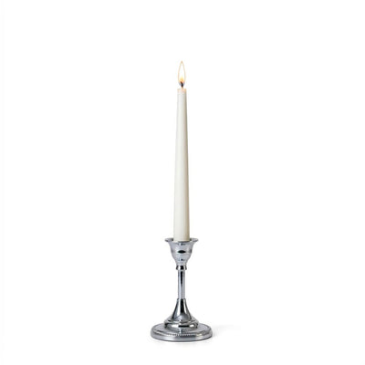 Lit white taper candle in a 5-inch silver candlestick holder on a white background - thumbnail number 3