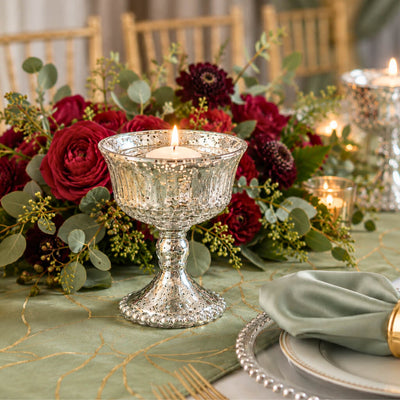 4.75" Silver Mercury Glass Compote with a lit candle among red flowers - thumbnail number 6