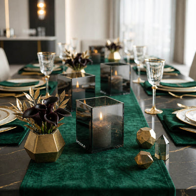 Sophisticated dining setup with squared mirrored glass candle holders and gold decor - thumbnail number 4