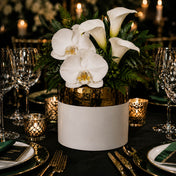 7.5" x 6.25" white and gold ceramic Claire pot filled with white orchids and calla lilies on a table - thumbnail number 5