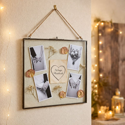 Hanging metal double glass frame holding wedding photos and rose petals - thumbnail number 3