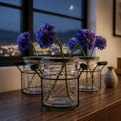 Blue flowers in 5" hobnail glass jars with frog lids and wire racks on a wooden table - thumbnail number 7