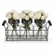 Metal wire basket with 3 glass mason jars and frog lids holding white roses - thumbnail number 2
