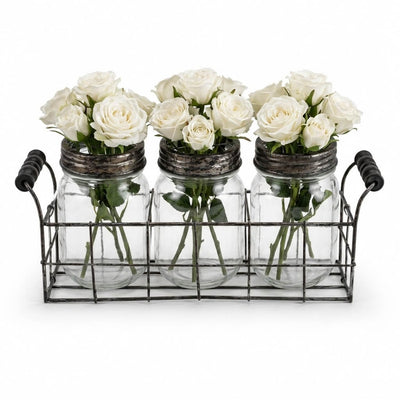 Metal wire basket with 3 glass mason jars and frog lids holding white roses - thumbnail number 2