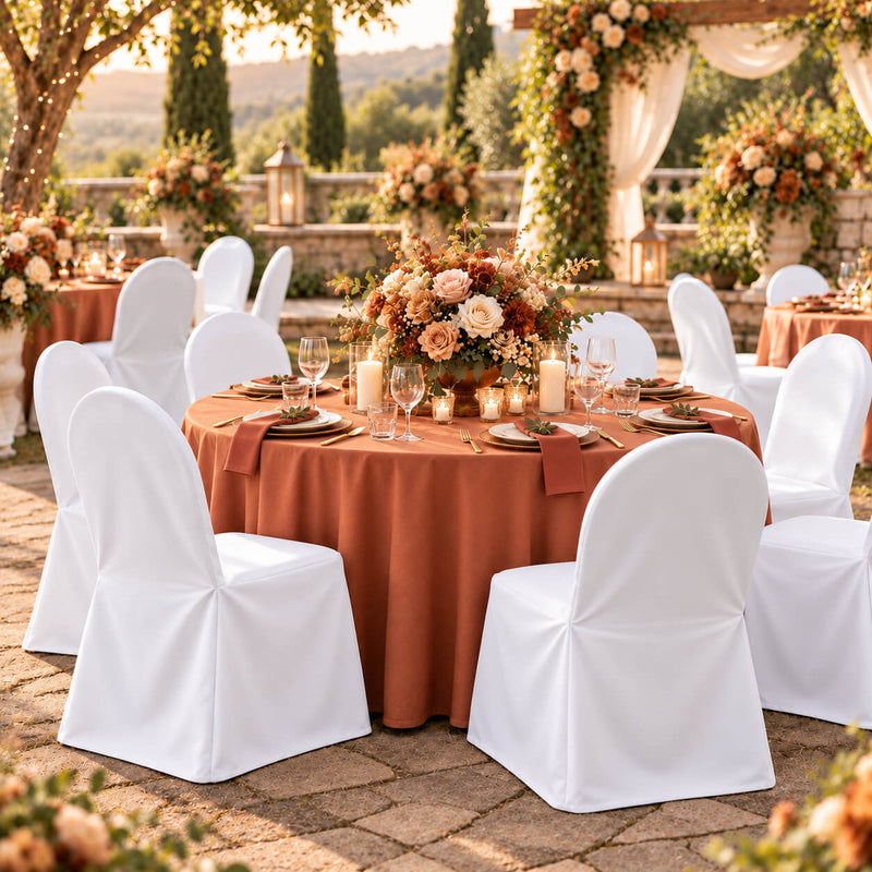 White banquet chair covers surrounding an autumn outdoor table setting - thumbnail number 3