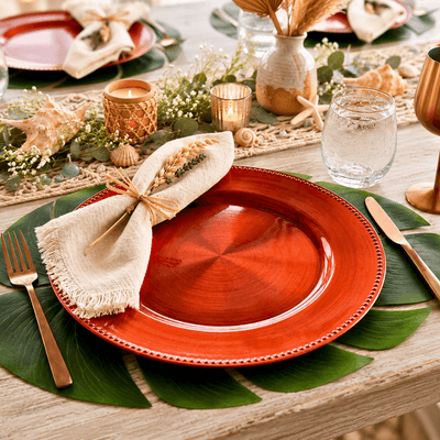 13" orange beaded charger plate in a coastal table setting - thumbnail number 3