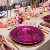 13-inch beaded charger plate in metallic fuchsia set on a formal dining table - thumbnail number 2