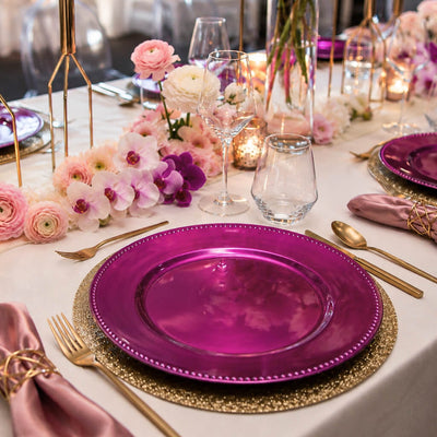 13-inch beaded charger plate in metallic fuchsia set on a formal dining table - thumbnail number 2