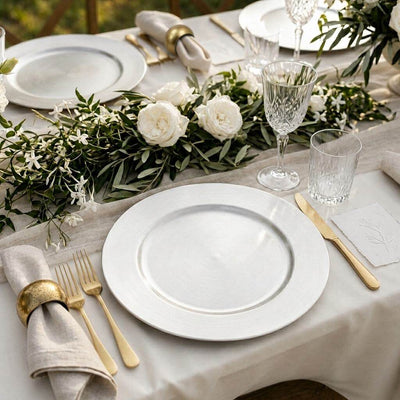 13 inch silver plain charger plate with white rose centerpiece on a formal dining table - thumbnail number 7