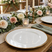 Gold-rimmed plate on a rustic floral tablescape - thumbnail number 4