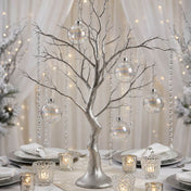 Iridescent glass ornaments hanging from a silver decorative centerpiece tree - thumbnail number 2