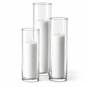 Three white pillar candles in staggered clear glass cylinder vases - thumbnail number 2