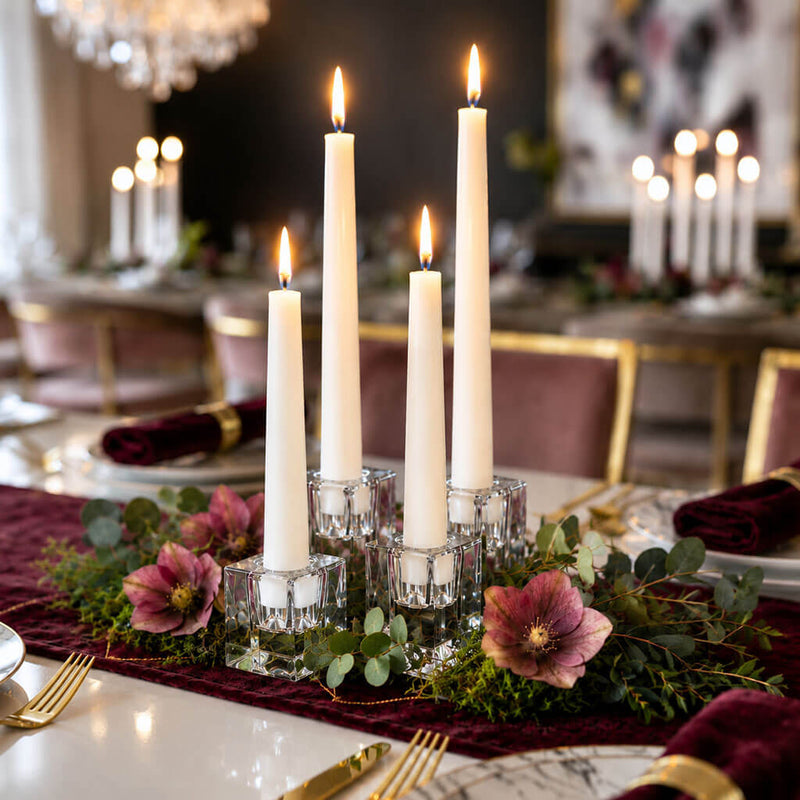Four lit white taper candles in square glass holders on a velvet runner with flowers - thumbnail number 7