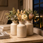 Three rustic ceramic vases filled with botanical arrangements - thumbnail number 6
