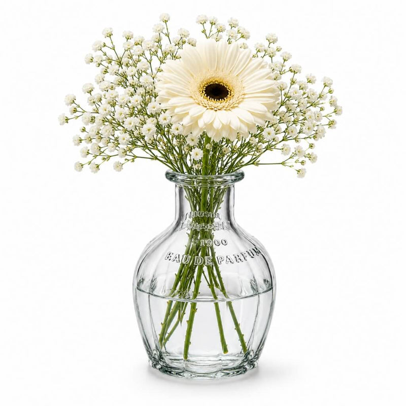 White daisy and baby's breath flowers in a vintage French parfum glass bottle - thumbnail number 2