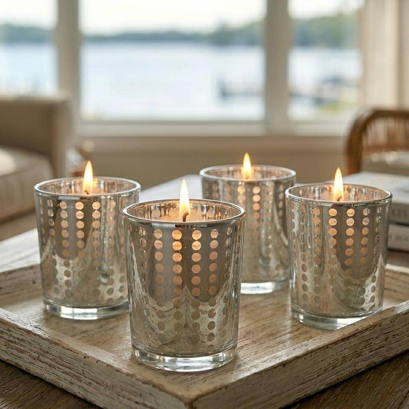 Silver dotted glass votive holders with lit candles on rustic wood tray - thumbnail number 8
