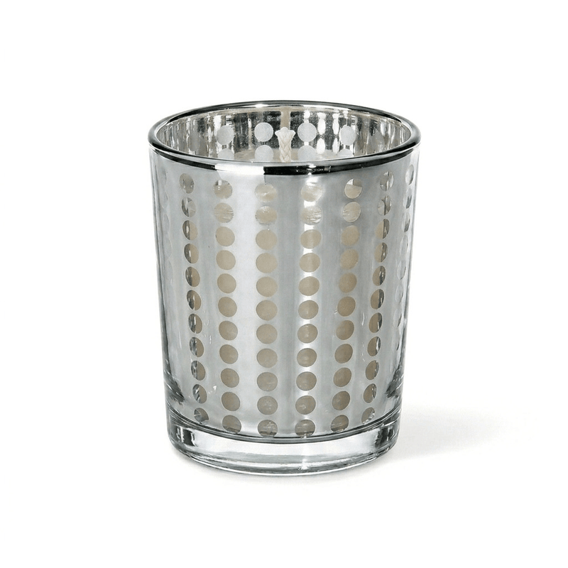White candle in silver dotted glass holder on white background - thumbnail number 2