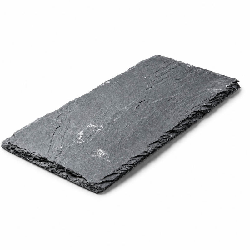 Angled view of a textured Rectangle Natural Slate Coaster on a white background - thumbnail number 1