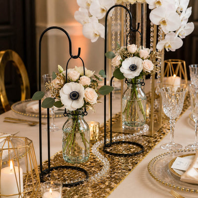 Vintage Bottle Hanging Glass Vases with floral centerpieces on a formal table - thumbnail number 4