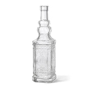 Decorative clear glass bottle with textured details on a white background - thumbnail number 1