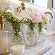 Clear Pineapple Glass Bud Vase set with fresh flowers on a marble vanity - thumbnail number 7