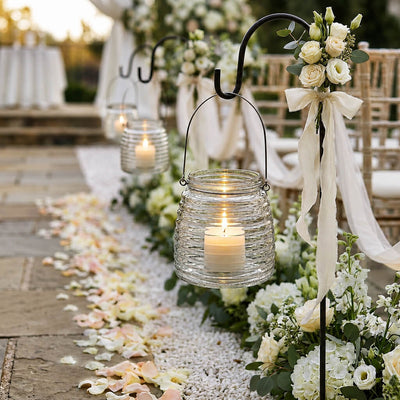 4.6" Hanging Horizontal Ribbed Glass Jar with Handle holding a candle at an upscale wedding aisle - thumbnail number 4