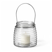 White votive candle in a 4.6" Hanging Horizontal Ribbed Glass Jar with Handle - thumbnail number 2