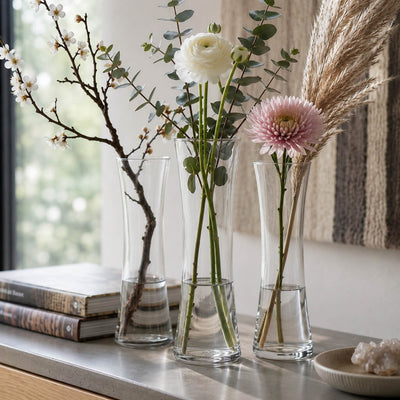 Three bud vases with floral arrangements on a shelf - thumbnail number 7