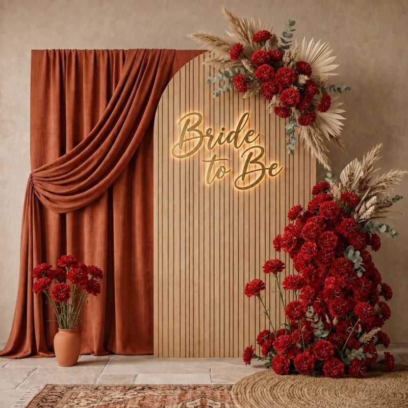 A 'Bride to Be' neon sign backdrop with 27" red carnations and pampas grass - thumbnail number 6