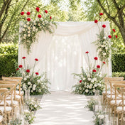 27" red carnations decorating a white wedding ceremony arch and aisle - thumbnail number 7