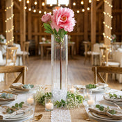 A 22-inch pink peony spray in a glass cylinder vase as a centerpiece on a wedding table - thumbnail number 3