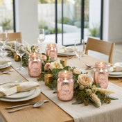Rose gold mercury mason jars with candles on a floral dining table - thumbnail number 5