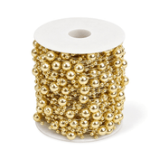 Spool of gold faux pearl string beads on a transparent fishing line - thumbnail number 1