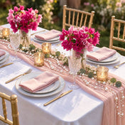 White faux pearl string beads draped along a pink table runner - thumbnail number 2
