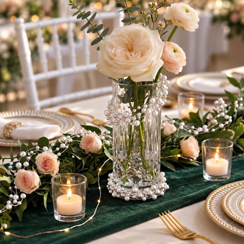 White faux pearl string beads draped on a glass vase with flowers - thumbnail number 3