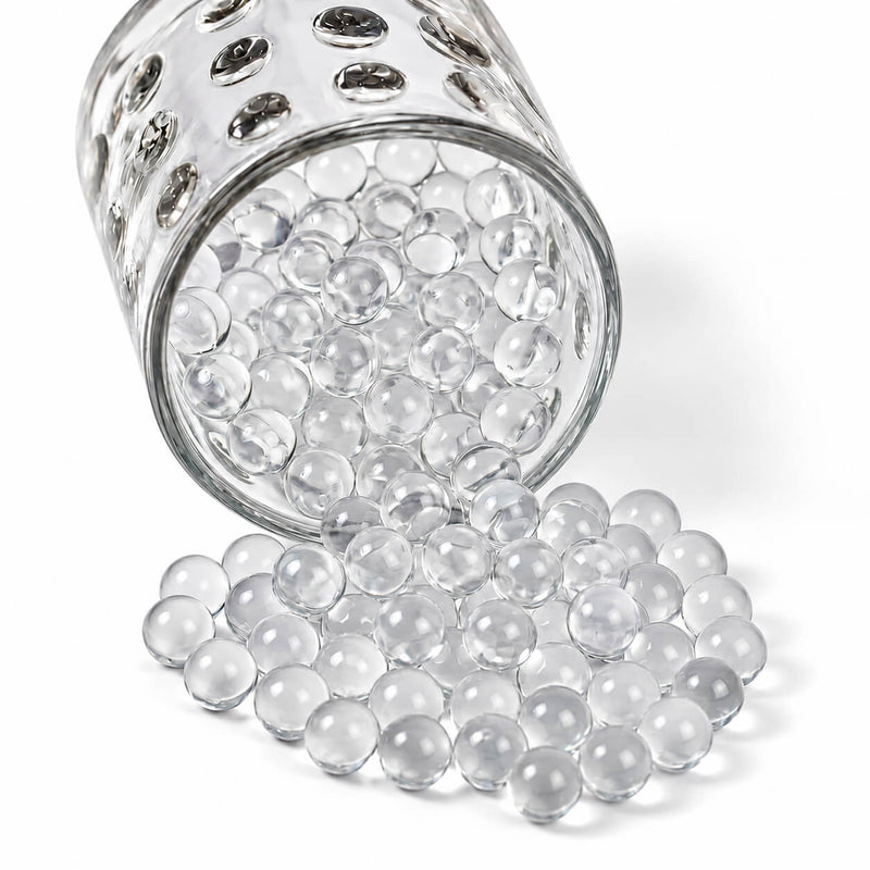 A glass jar spilling clear water gel beads - thumbnail number 1