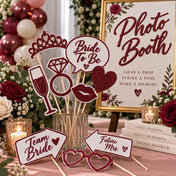 Burgundy glitter bridal shower photo booth props in a glass jar next to a sign - thumbnail number 6