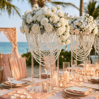Tall crystal beaded acrylic stand displaying a white rose floral arrangement for a beach wedding - thumbnail number 6