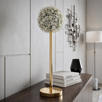 Gold metal stand topped with a white floral sphere displayed on a modern console table - thumbnail number 7