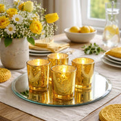 Four Gold Mercury Votive Holders on a round mirror with yellow floral centerpieces - thumbnail number 9
