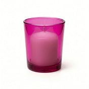 White unscented candle in pink glass votive holder - thumbnail number 1