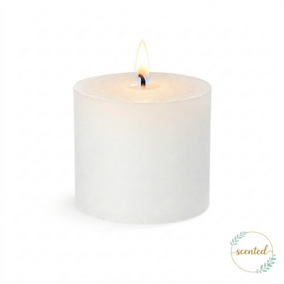 A lit white votive citronella candle on a plain white background with a logo sticker - thumbnail number 4