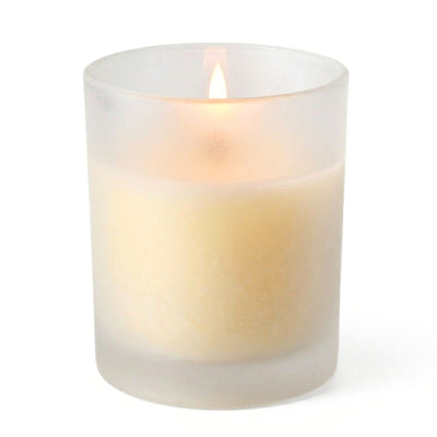 Frosted Votive Holder with a single burning ivory candle against white - thumbnail number 2